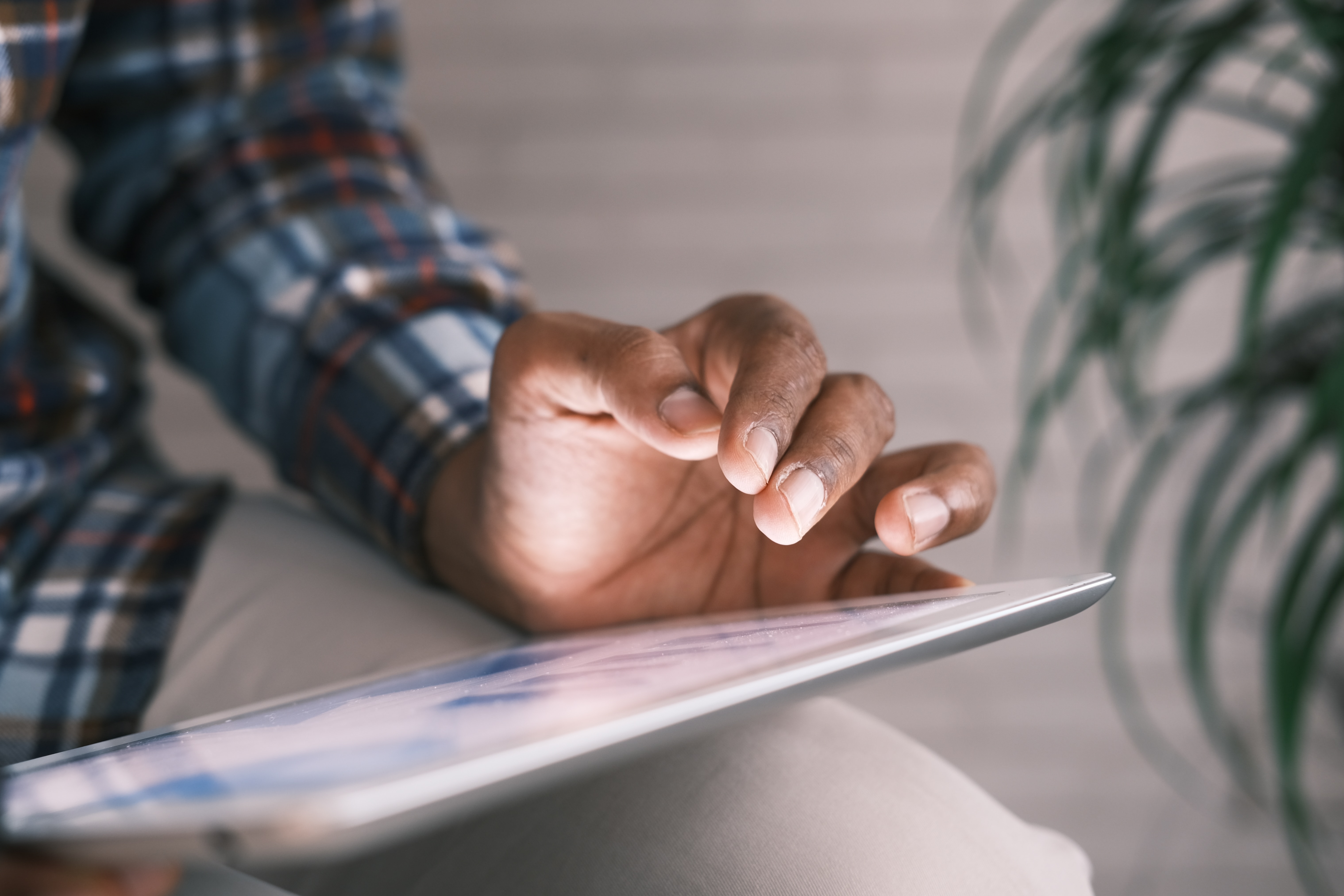 Man surfing web on tablet device