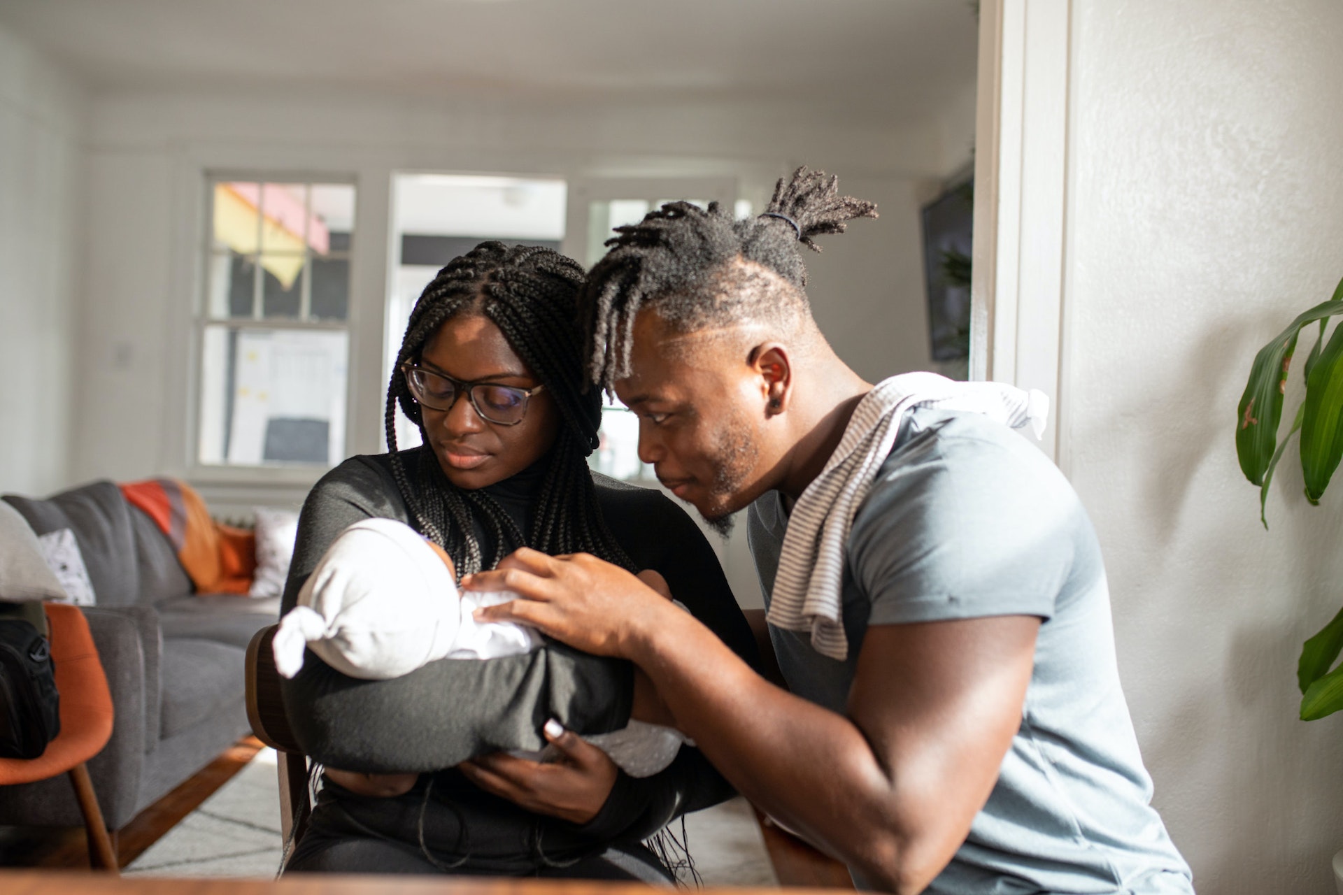 Father and Mother with newborn baby