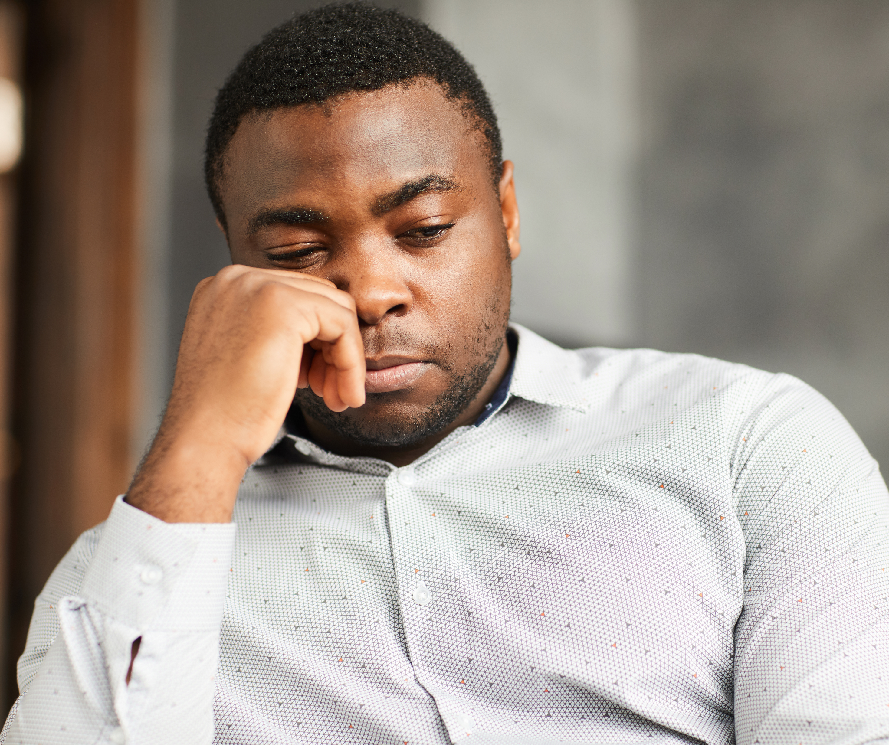 Middle-aged man unhappy, needing assistance with selecting retirement policies