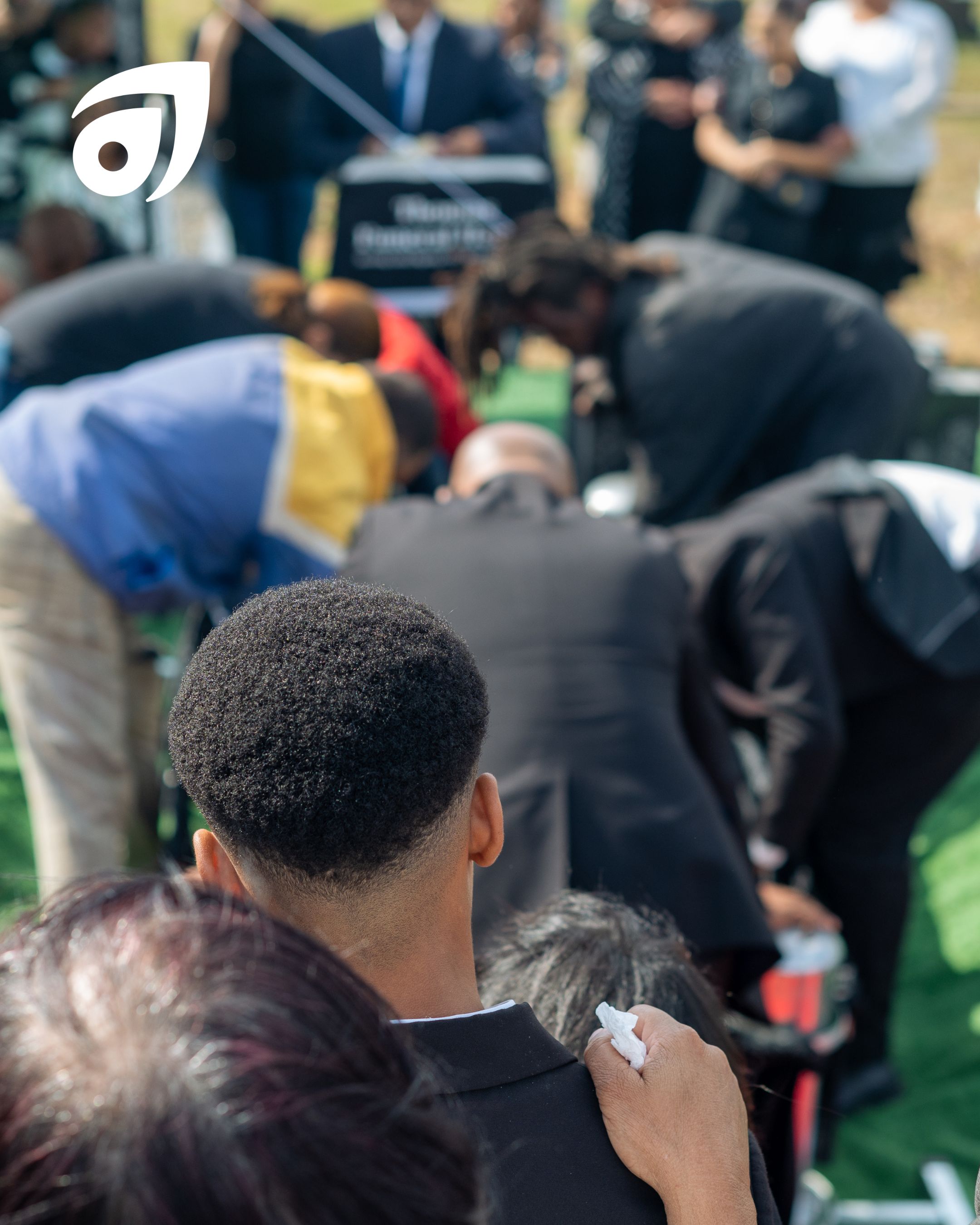 People attending a funeral