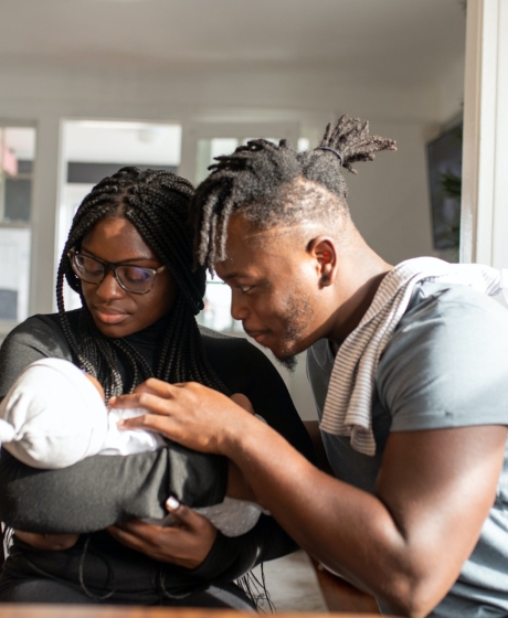 Father and Mother with newborn baby