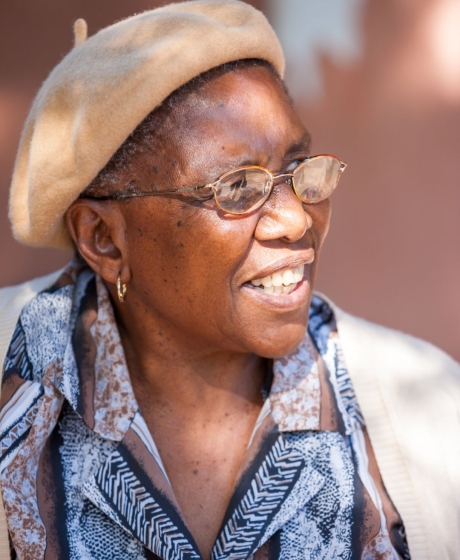 Elderly women smiling outside