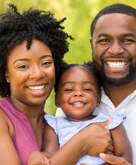 African family of 3, young baby, middle aged parents